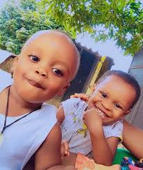 An African childhood. Who can't remember the simplicity and beauty of  moments like this?