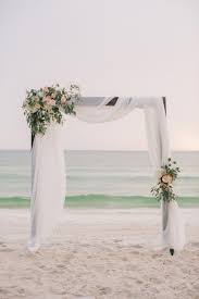 Simple Beach Wedding Decor Inspiration Florida Wedding Flowers Photography Pure7 Studios Wedding Beach Ceremony Beach Wedding Arch Wedding Decorations