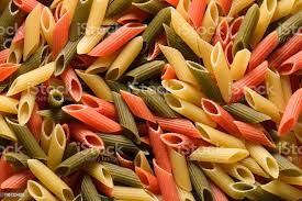 Foto De Closeup De Macarrao Penne Cru E Colorido E Mais Fotos De Stock De Abundancia Istock
