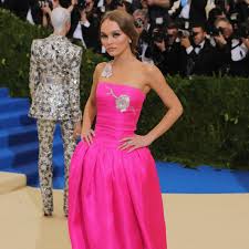 May convey such feelings as awe or disbelief often milder or more ironic in tone than face screaming in fear. Met Gala 2017 Lily Rose Depp Wears Hot Pink Chanel Teen Vogue