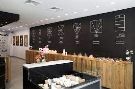 ich kar opens french cheese board a new concept store in nolita restaurant interior design coffee shop decor interior design magazine