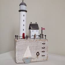 Light up your rooms with some homemade creative light fixtures. Little Keepers Cottage Harbour Handmade Lighthouse Ladder Sea Seaside Sailboat Shabbydaisies Flag House Ornaments Little Cottages Driftwood Art