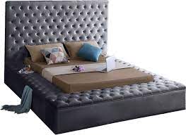 Upholstered side rails create an elegant look that matches perfectly with a classic tufted upholstered headboard. Meridian Furniture Bliss Collection Modern Contemporary Velvet Upholstered Bed With Deep Button Tufting And Storage Compartments In Rails And Footboard Gray Queen Buy Online In Belgium At Desertcart Be Productid 89932856