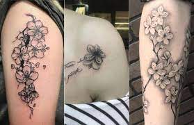 Cherry Blossom Tattoo Meaning Designs Ideas And Much More Cherry Blossom Tattoo Shoulder Cherry Blossom Tattoo Cherry Blossom Tree Tattoo