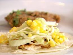 Put the garlic, cilantro, lime zest, cumin, salt, and pepper in a small food processor bowl and pulse until combined, approximately 20 seconds. Ellie S Simple Fish Tacos With Chipotle Cream Fn Dish Behind The Scenes Food Trends And Best Recipes Food Network Food Network