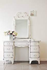 This barn door vanity is sure to please. What To Keep In Mind When Buying Collectibles Antiques White Painted Furniture Antique Vanity Distressed Furniture