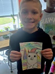 Our art students had so much fun creating these bright Frozen Tundra  landscapes inspired by Ted Harrison. Each piece features a bold polar bear  and colorful winter skies. It feels extra fitting