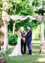 Romantic Wooden Arbor For The Wedding Ceremony Draped In Soft White Fabric Pastel Pink And Peach Floral Ar Wedding Trellis Wedding Arbors Wood Wedding Arches