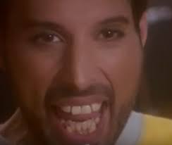 How many extra teeth did Freddie Mercury have?