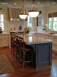 The kitchen island deploys plain material as the countertop. Granite Kitchen Island With Seating Ideas On Foter