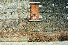 A Basketball Hoop Seen In An Alley Venice Italy Basketball Hoop Italy Basketball