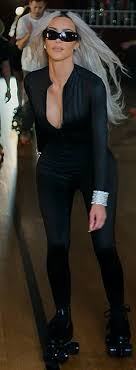 Kylie Jenner and Kim Kardashian slip into catsuits and roller-skates to  film opening scene