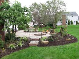 15 Landscaping Ideas Around Patio And Paved Areas Patio ideas for concrete patio plans and placement. 15 landscaping ideas around patio and