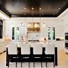 The dark tile ceiling is the best style, combined with dark countertops, make your kitchen outstanding. 1