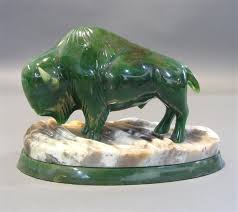 When i first saw the calcite base i knew this sculpture had to have a bear subject involved with it. Sopel Lyle Thundering Spirit 2004 Mutualart