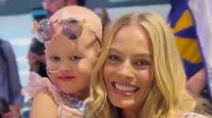Margot Robbie's miracle mate: How a hug from real-life Barbie Margot Robbie  boosted Lucy's cancer battle