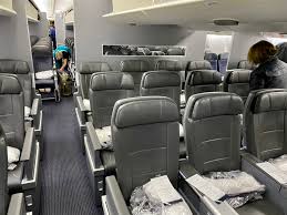 The aircraft cabin in three class configurations has 305 passenger seats. Review American Airlines Premium Economy Dallas To Buenos Aires Dfw Eze First Class Giraffe