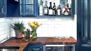 Navy Blue Cabinets With Wood Countertop Google Search Blue Kitchen Cabinets Blue Cabinets Kitchen Cabinets
