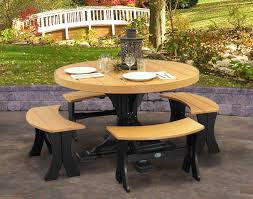 The bench is straight out of a country cottage. Poly Lumber 5 Piece Round Picnic Table With Benches