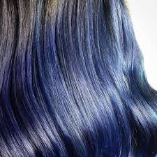 Dark blue hair with stripes of black in between looks incredible. How To Achieve The Blue Black Hair Color Look Wella Professionals