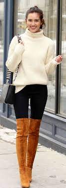 Long black boots and black body. Camel Boots