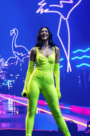 Dua Lipa Opened Her World Tour in a Showstopping Neon Catsuit — See Photos  | Teen Vogue