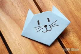 These instructions will show you how to fold a very easy origami cat face. How To Make An Origami Cat Face