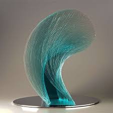 Artist Niyoko Ikuta Uses Layers Of Laminated Sheet Glass To Create Spiraling Geometric Sculptures Geometric Sculpture Glass Art Glass Art Sculpture