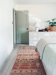 Choosing a rug that's too small for a large bedroom will throw the space off balance. Master Bedroom Rug Reveal Nightstand Makeover And Affordable Rugs