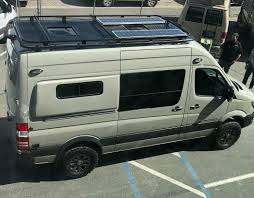 A View From The Top Of Sportsmobilewest Latest 4x4 Sprinter Van Build With Aluminess Gear Aluminess Roofrack S Sprinter Van Van Ford Transit Roof Rack