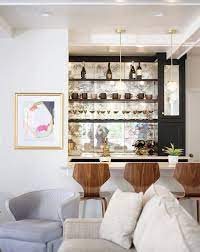 A mini home bar styled as a barrel of dark stained wood and metal is a quirky idea or decoration. 15 Ways To Turn Your Living Room Into The Hottest Bar In Town