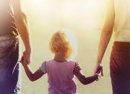 Image result for image of parents holding their child