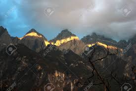 A visit to yunnan's lijiang is made way more me. Tiger Leaping Gorge And Yulong Xueshan Mountain Range In Yunnan Southern China Stock Photo Picture And Royalty Free Image Image 72385052