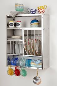 Another great way to get utensils out of your drawers and into a more creative storage set up is to build a shelf out of tin cans and a piece of wood. Wall Mounted Utensil Rack Ideas On Foter