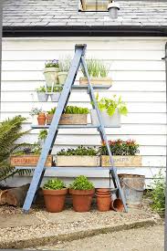 15 Creative Diy Plant Stand Ideas Garden Lovers Club This corner stand can fit 5 or more potted plants depending on the size.