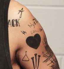 See a recent post on tumblr from @wyngarde about harry styles tattoos. Coat Hanger Tattoo On Harry Styles Left Arm By His