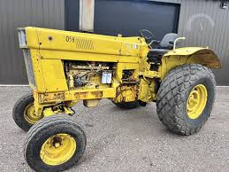 Image result for Yellow 1972 Tractor