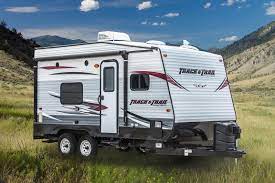 This opening is designed to allow easy access to any toys or adventure gear the owner might be traveling with (atvs, motorcycles, mountain bikes, etc.). 25 Toy Haulers Ideas Toy Hauler Toy Hauler Camper Camping Trailer