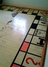 Man Discovers Giant Monopoly Board Under Carpet Ripping Up Carpet Painted Boards Diy Carpet