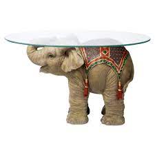 Indian handmade beautiful wooden elephant shape decorative stool, footstool. Design Toscano Jaipur Elephant Festival Indian Decor Coffee Table With Glass Top 30 Inch Polyresin Full Color Buy Online In United Arab Emirates At Desertcart Ae Productid 15054203