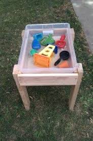 Easy Diy Water Table Love That You Can Snap The Lid On The Bin Makes Easy Sensory Bin Clean Up As Well Toddler Water Table Water Table Diy Toddler