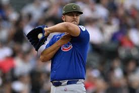 Cubs starter Jameson Taillon tips his cap to Munetaka Murakami