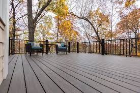 Deckorators Deck In Ironwood With Black Metal Railing Looking For Endless Color And Style Choices Without The Maintenance Synthetic Decking Deck Custom Decks