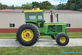 Image result for Yellow 1972 Tractor