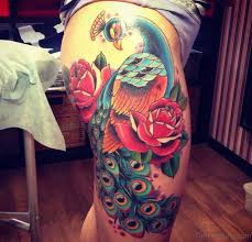 Peacock tattoos are extremely graceful and beautiful. 49 Superb Peacock Tattoo On Thigh