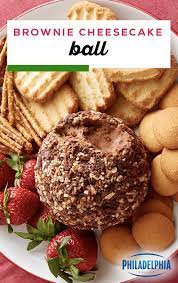 Brownie Cheesecake Ball Combine Two Desserts Into One With This Sweet Cheese Ball Pre Made Brownies Philadelphia Cream Cheese Ball Recipes Food Sweet Dips
