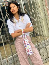 Hand embroiderd flowers on the neck. Kalinka Knit Top White Lisa Says Gah