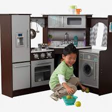 Teamson kids little chef florence classic kids play kitchen toddler pretend play set with accessories, 2 drawers, and clock wood grain. 10 Best Toy Kitchen Sets 2021 The Strategist New York Magazine