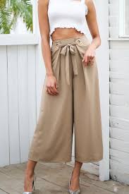 These 12 types of pants are the evergreen fashion styles which are popular all around the world. Wide Leg Capris Pants Street Style Women Khaki Color Stylish Pants Fashion Outfits Women Fa Pants Women Fashion High Fashion Street Style Fashion Clothes Women
