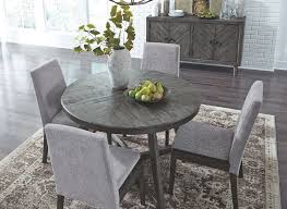 Make casual dining chic and cozy with the round dining table. Besteneer Dark Gray 6 Pc Round Dining Room Table 4 Upholstered Side Chairs Server Mathis Brothers Furniture